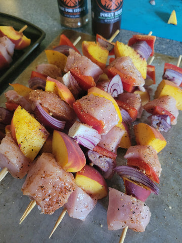Seasoned peach and pork skewers