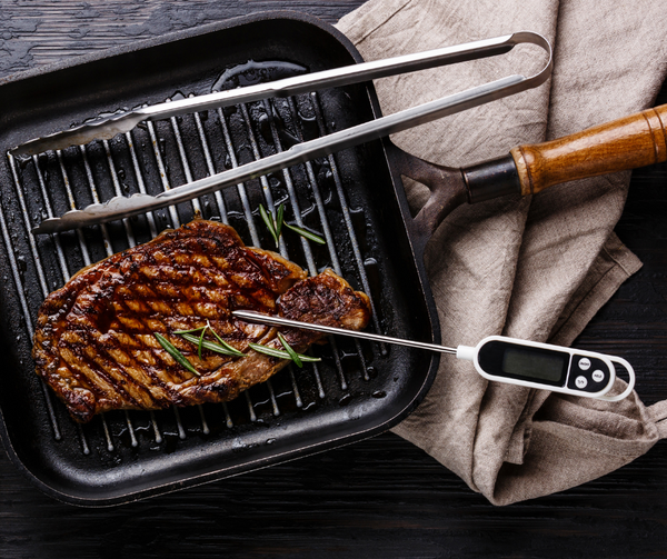 Steak in Cast Iron with Meat Thermometer