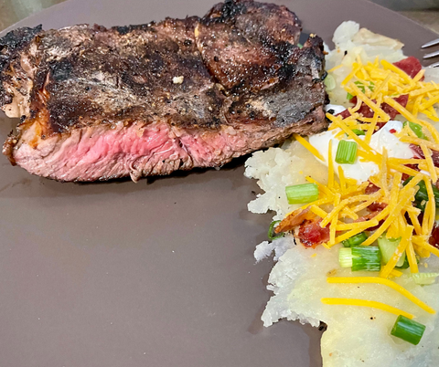 Steak Cut Open With Potatoes