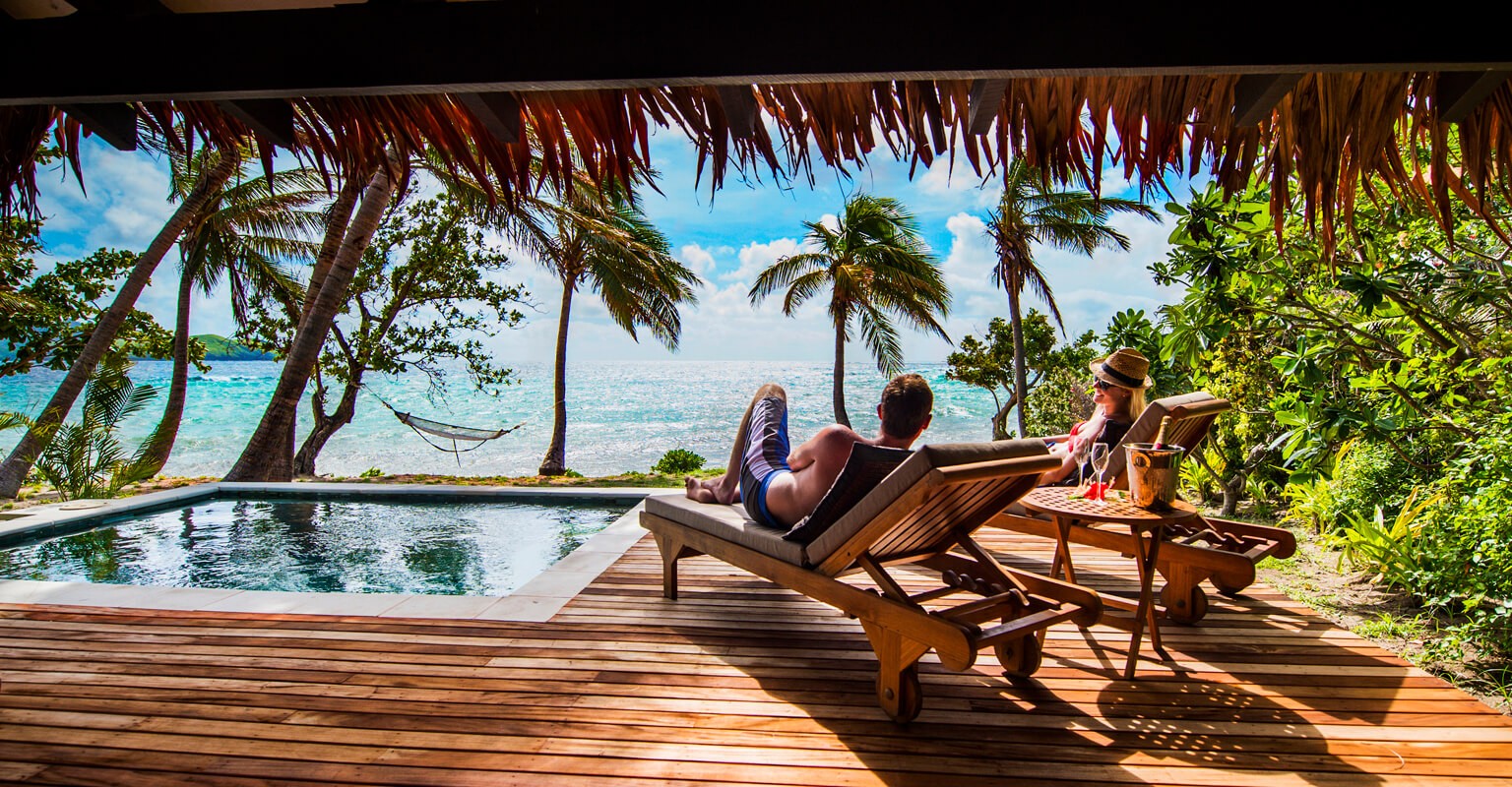 Tokoriki-Island-Resort-Resort-Fiji-Islands-Couple-on-Lounge-Chairs